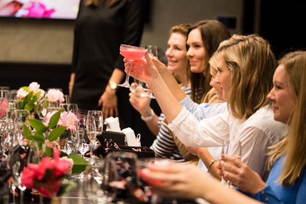 Guests toast Designer Brands' 10th Anniversary